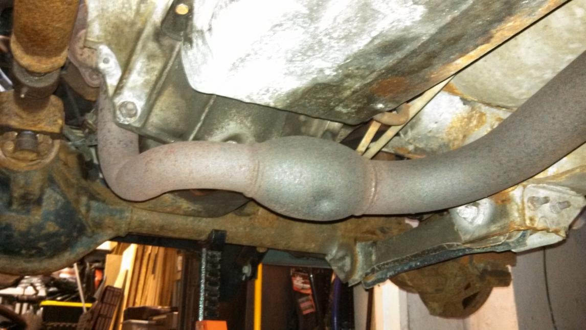 12128d1354154695-exhaust-down-pipe-dent-99-jeep-pre-cat.jpg