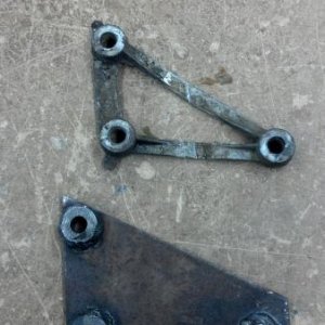 Stock steering brace and fabbed one